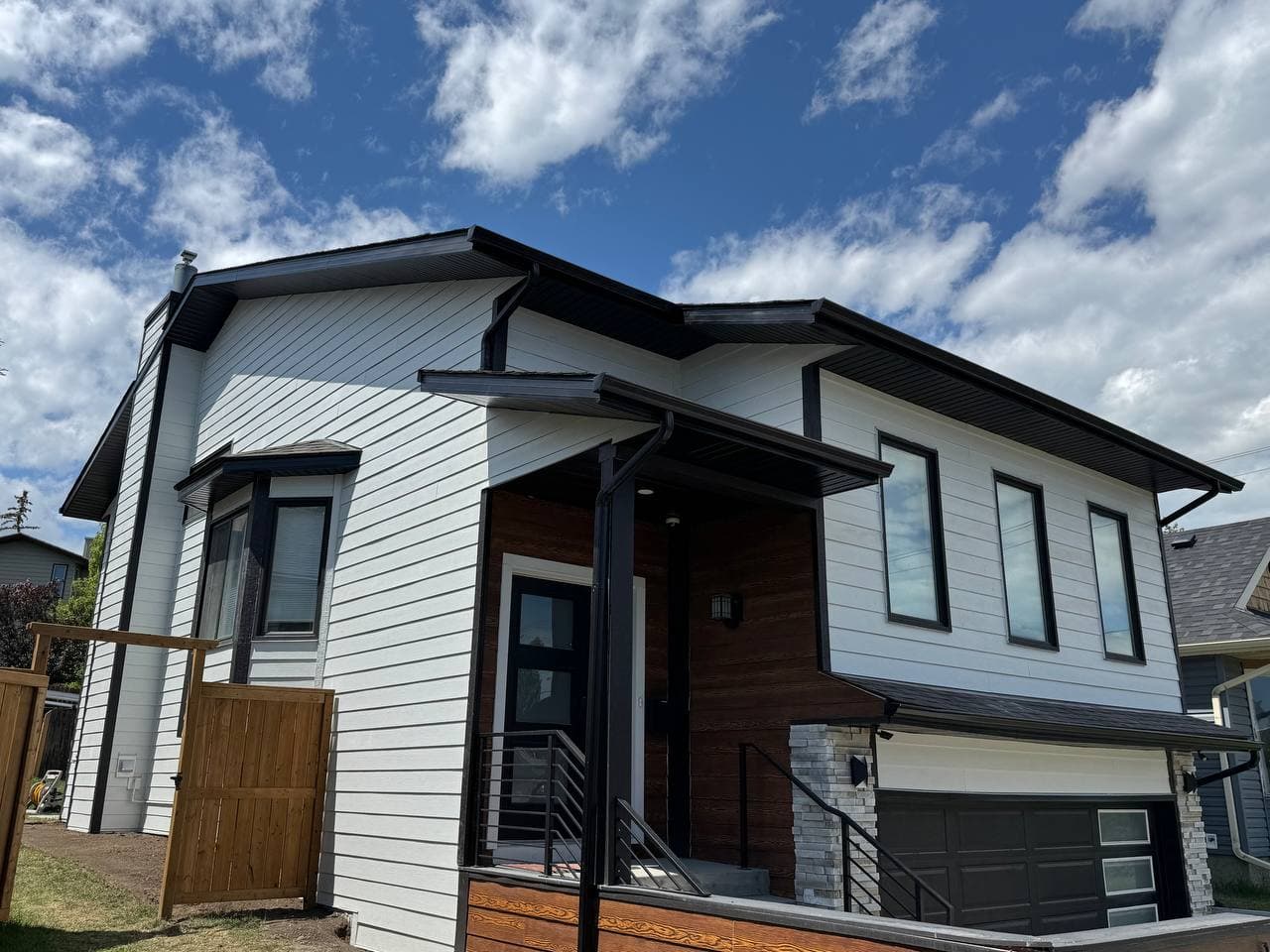 Full exterior renovation replacing outdated vinyl siding with durable Hardie board. The upgrade enhances curb appeal while significantly improving protection and long-term performance.